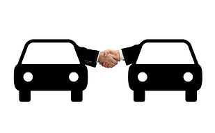 cars shaking hands